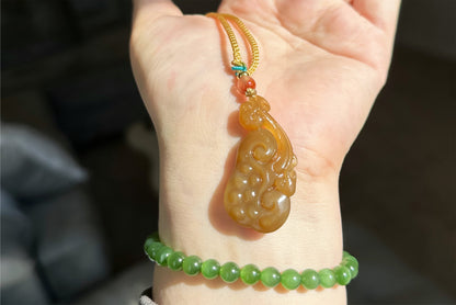 Certified Natural Qiemo Sugar Nephrite Jade Hand-Carved Ruyi Pendant, 天然且末糖手工雕刻如意吊坠