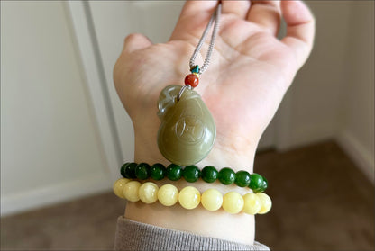 Certified Natural Qiemo Sugar and Warm White Nephrite Jade Hand-Carved Money Bag Pendant, 天然且末和田玉青白带糖手工雕刻钱袋吊坠