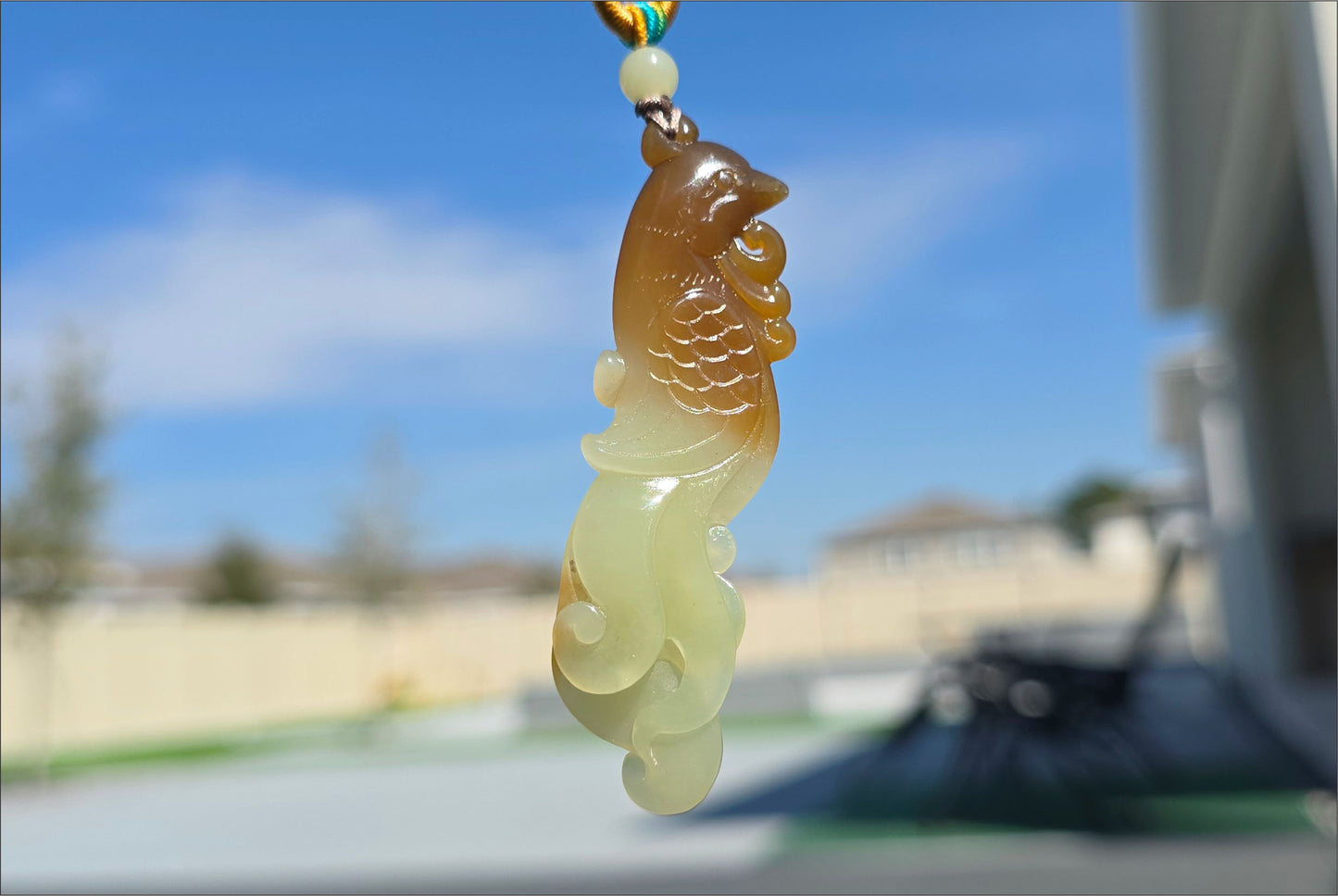 Certified Natural Sugar Brown and Yellow Nephrite Jade Hand-Carved Phoenix Pendant, 天然若羌黄口带糖手工雕刻凤凰吊坠