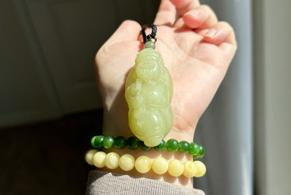 Certified Natural High-Quality Ruoqiang Yellow Nephrite Jade Hand-Carved God of Wealth Pendant, 天然若羌黄口手工雕刻财神吊坠