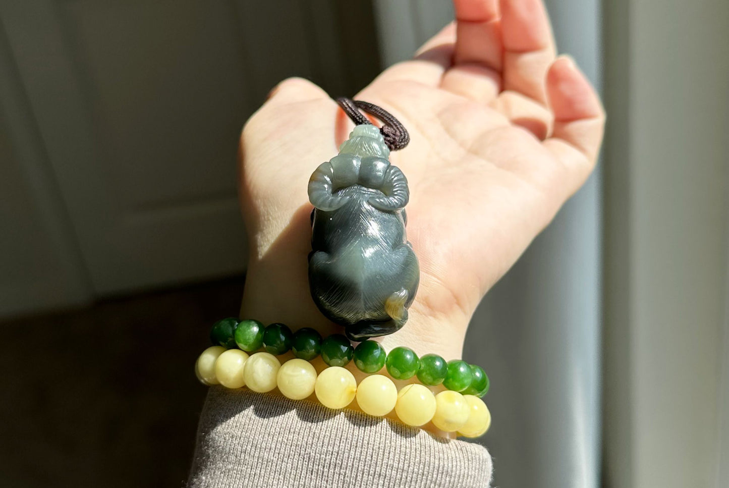 Certified Natural Loulan Tricolor Nephrite Jade Hand-Carved Ox Pendant, 天然楼兰三色和田玉手工雕刻牛吊坠（扭转乾坤）